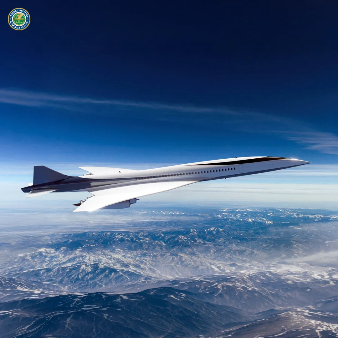 A sleek, futuristic supersonic jet is flying high above the clouds with a clear blue sky as the backdrop. Snow-capped mountains are visible below, contrasting with the jet's smooth, white exterior. The FAA's logo is displayed in the top left corner.