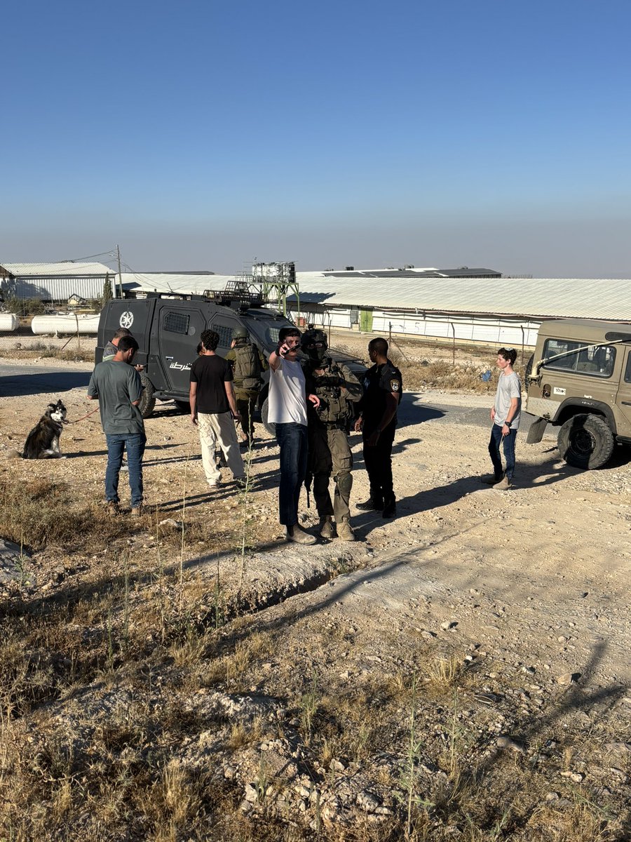 infinite_jaz's tweet photo. One of the settlers directing soldiers to detain me. Which they did. They demanded my phone and passcode. I refused and they told me I was under arrest. Then twenty minutes later they just left. https://t.co/NZ7am6qRWf