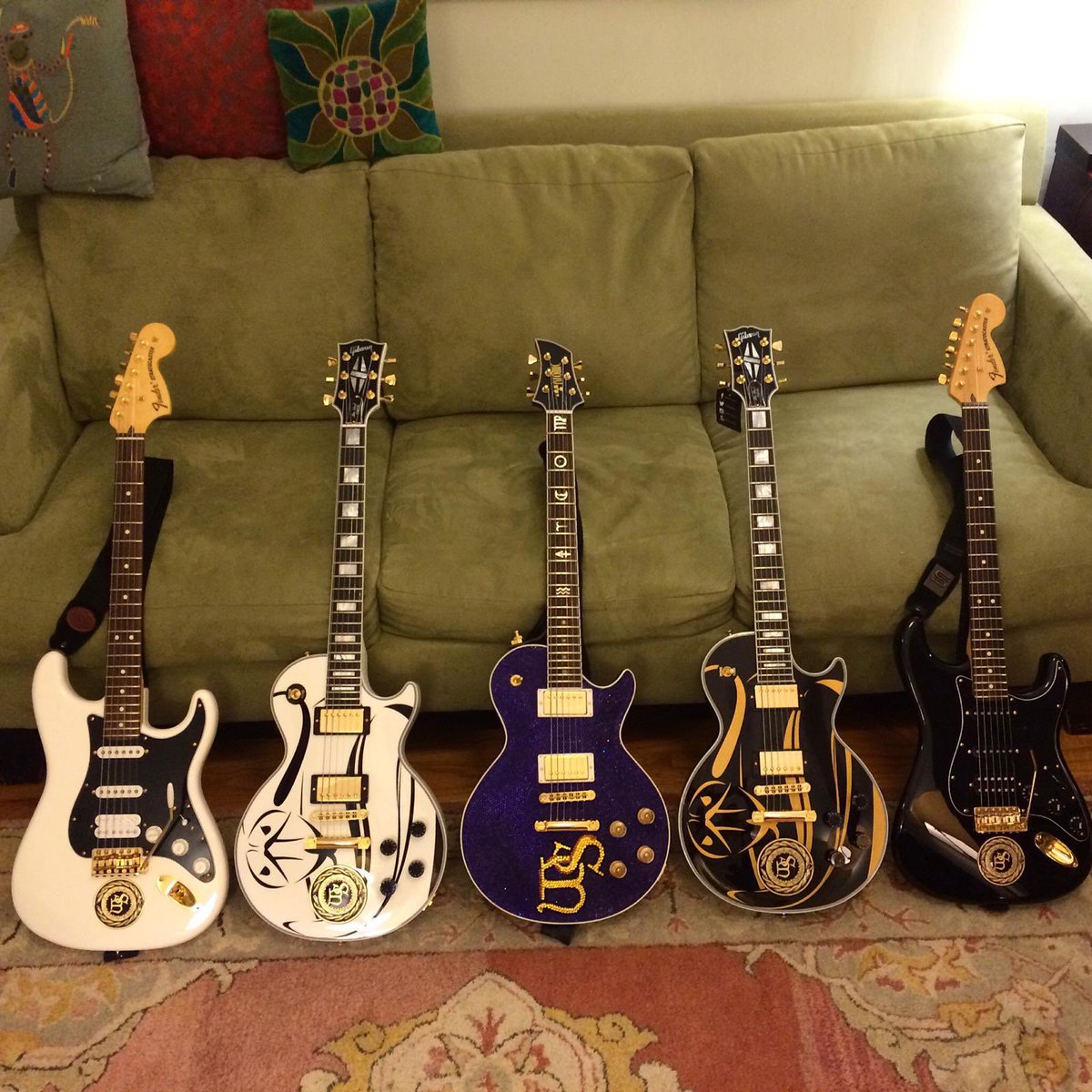 joelhoekstra13's tweet photo. Back when I joined Whitesnake in 2014 I had the vision of playing a Black Custom Les Paul and a White Custom Les Paul with Whitesnake medallions set into the bodies.  Because we were recording The Purple Album, I added a Black Fender Strat and a White Fender Strat to that vision.  I had the medallions made at Northwest Territorial Mint and then sent to Gibson/Fender for the builds.  Gibson added a snake stencil to the Les Pauls for good measure.  Then Atomic Guitar Works approached me about a Les Paul style guitar covered in hand-layed purple Swarovski Crystals and gold Swarovski Crystals for the signature Whitesnake “WS”.  The fret inlays are astrological symbols that represent different elements of my life.  I played every Whitesnake show from 2015-2023 with those 5 guitars.  

So, what’s my point?  Well, I own a lot of guitars, space is hard to come by in NYC and now that Whitesnake is no longer touring, I’ve been wondering if they wouldn’t go to better use if someone else owned them.  No, I’m not “retiring” and selling ALL of my gear, etc.  I’m just thinking of selling these guitars specifically.

They’re not officially available just yet, but I’m gauging interest.  So….anyone interested?