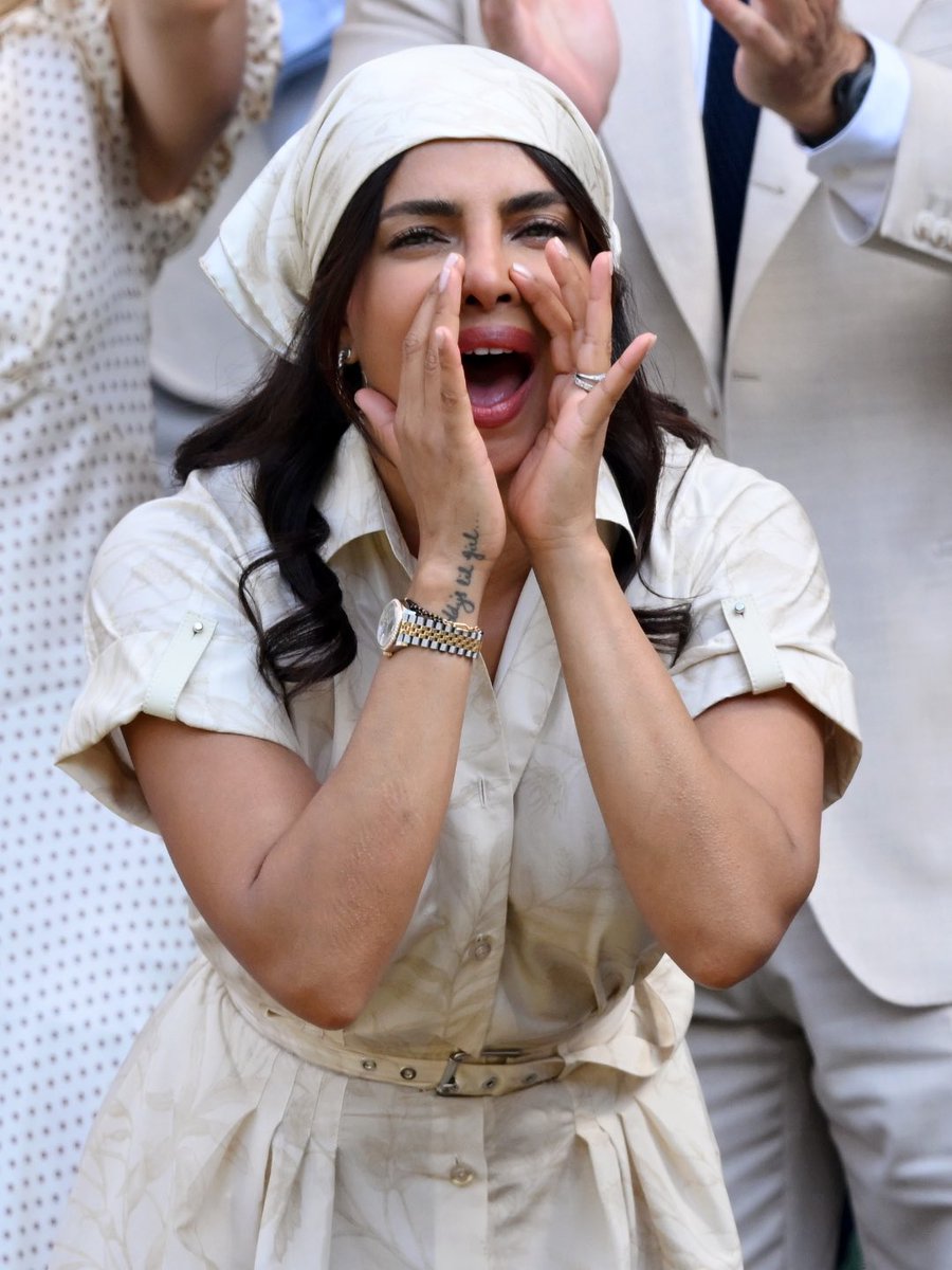 HELLOmagIndia's tweet photo. #Wimbledon regular #PriyankaChopra Jonas made the most of her day at #CentreCourt—FaceTiming #NickJonas from the #RoyalBox before riding every emotion of #KarolínaMuchová's 6-1, 1-6, 7-6 win over #CocoGauff to reach the Ladies' Singles Final 2026. #HELLOIndia #HELLOMagazine https://t.co/Wj3hjzmHgF