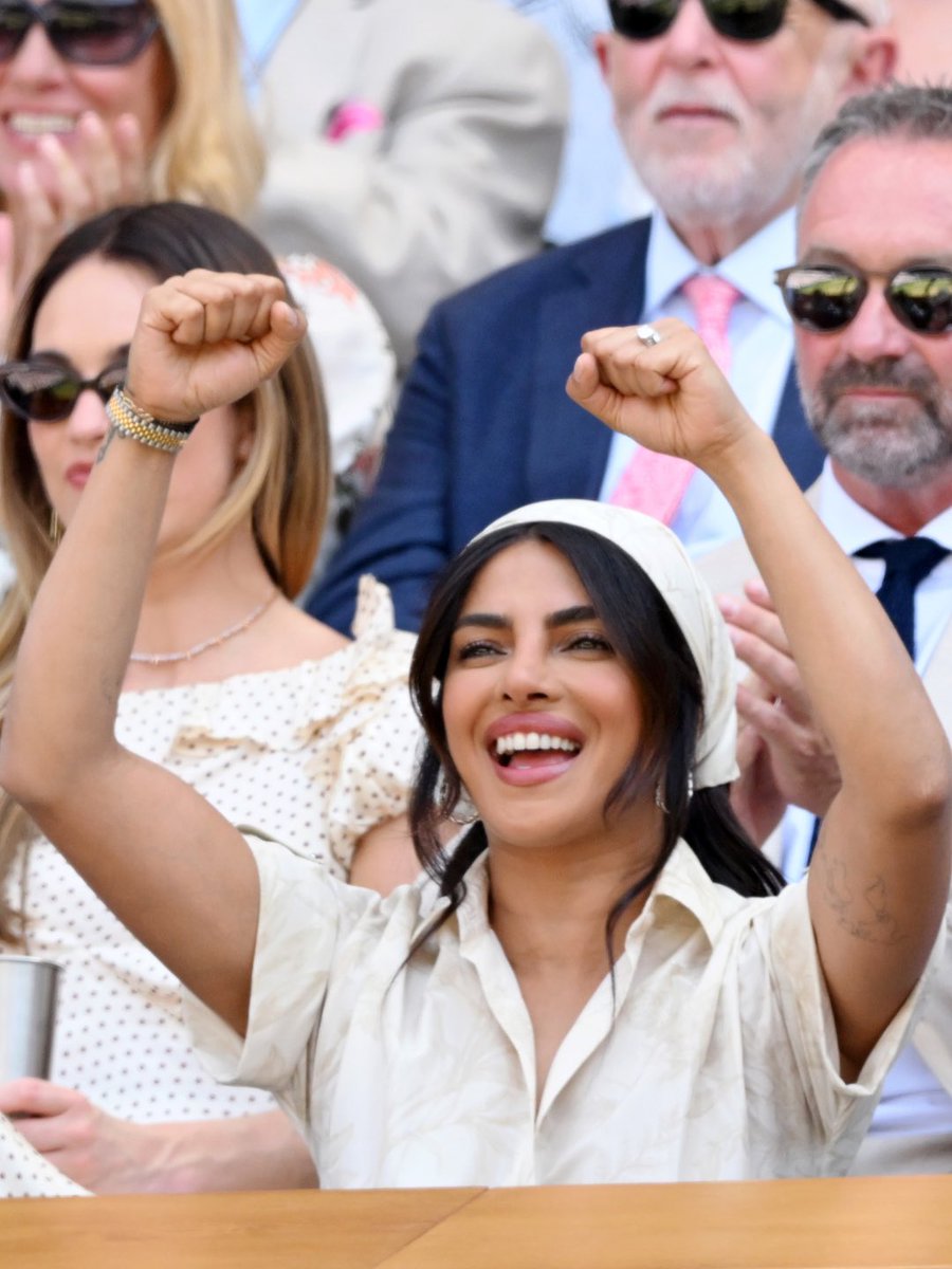 HELLOmagIndia's tweet photo. #Wimbledon regular #PriyankaChopra Jonas made the most of her day at #CentreCourt—FaceTiming #NickJonas from the #RoyalBox before riding every emotion of #KarolínaMuchová's 6-1, 1-6, 7-6 win over #CocoGauff to reach the Ladies' Singles Final 2026. #HELLOIndia #HELLOMagazine https://t.co/Wj3hjzmHgF