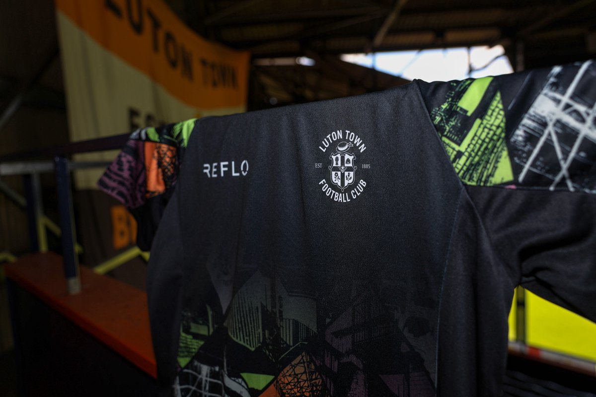 LutonTown's tweet photo. Home never leaves you 🏡🧡 

The new Matchday Training collection is now available online and in the Club Shop. https://t.co/8VeNBqwJPu