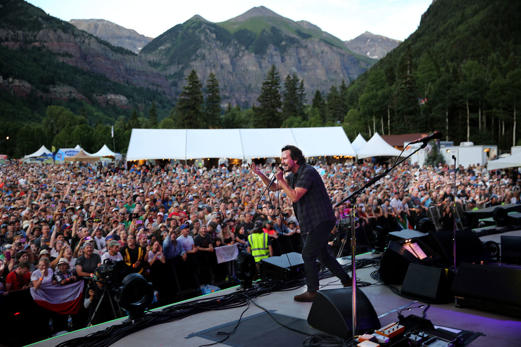 PearlJam's tweet photo. Playing in thin air. 10 years ago at The Ride Festival. 🚠🏔️🌲🎸

📸: Karen Loria https://t.co/mBOd1qQOgl