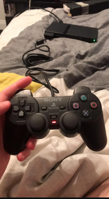 _Noctisvex's tweet photo. Finally got my hands on a legit PS2 controller after being scammed buy a knockoff. https://t.co/jv54QVfblR