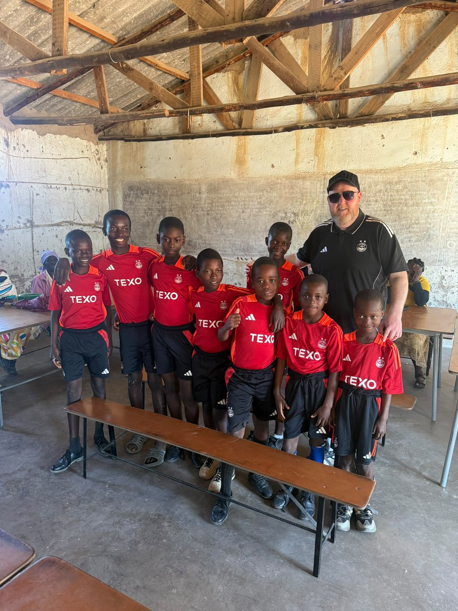 jimfraser444's tweet photo. Some new Aberdeen FC fans in Zimbabwe with our Lead Scout from Banffshire Mike Duncan. Thanks to the AFC kit guys for accommodating Mike on his annual mission 🇦🇹🇦🇹🌟🌟❤️ https://t.co/eGLMJZu3fi