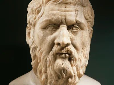 Kristof_Poland's tweet photo. Now Plato – the most dangerous philosopher who ever lived.

Aristotle was his student, his corrector, and in the end his antidote. The argument between them is not ancient history. It is the argument the West is currently losing.

1. Plato distrusts the world. Everything visible, tangible, particular — the market, the body, the individual — is mere shadow to him. Reality is the Form, the Ideal, the perfect abstraction accessible only to the philosopher. This is not just a metaphysics. It is a politics. If the real is abstract and only the philosopher can access it, then only the philosopher should rule. The Republic follows necessarily from the theory of Forms. Plato built the first blueprint for technocratic tyranny and called it philosophy.

2. His perfect state is governed by philosopher-kings – selected, trained, and self-perpetuating. They know what is good for you better than you do, because they have access to the Forms and you do not. This is every credentialist institution, every expert class, every central planning committee that ever existed, dressed in a toga and speaking Greek. The technocrat ruling by divine right of competitive examination is a Platonic philosopher-king who has forgotten the philosophy but kept the power.

3. Idealism and absolutism are the intellectual disease of humanity. By avoiding collision with reality, they produce arrogant delusion – and arrogant delusion combined with power produces totalitarianism. This is the precise opposite of what built Western strength: individual freedom, competition, and meritocracy – a system that encourages everyone to create maximum value and gives the greatest room to those who do it best. Instead of a system of obedience to intellectual and physical bullies.

4. It started seriously with Plato, reached its apex with Hegel, and today’s Marxisms and deconstructionisms are merely the dishwater left behind. What they all share is the same social profile of origin: blasé, bored boys from wealthy homes, untouched by the pressure of real survival, inventing their idealisms in comfortable detachment from consequences. Unfortunately, detachment from reality impresses many simple minds with intellectual pretensions. They listened. The results were fatal. Millions of corpses.

5. Plato invented the "Noble Lie" – the idea that the ruling class should deceive the population for its own good. He considered it governance. Every ideology that has ever lied systematically to its population was, consciously or not, working from Plato’s manual. Every ministry of propaganda, every content moderation policy removing unauthorized narratives is Plato’s Republic with updated technology.

6. Aristotle walked into Plato’s Academy, studied there for twenty years, and then systematically dismantled everything. Where Plato saw Forms, Aristotle saw particulars. Where Plato trusted the philosopher, Aristotle trusted the middle class. One tradition produces science, common law, and the free market. The other produces utopias – and the violence required to build them. And in the process, two and a half thousand years of sophisticated abstraction buried the most obvious truth available to any living organism: that our purpose is to pass life forward, to create the most flourishing possible next generation. Simple. Obvious. Covered over by millennia of sophisticated raving of Platonists.

7. Every great man-made catastrophe of the modern era has Platonic DNA – the French Revolution’s Republic of Reason, Marxism’s scientific laws of history, Mao’s New Man. Each one began with a Form and required that the imperfect world be forced to conform to it. The pile of bodies is not an accident of implementation. It is what happens when you take Plato seriously enough to act on him. Aristotle’s answer sounds less glamorous: look at what actually exists, work with what human beings actually are, build institutions that survive contact with reality. Sounds less beautiful. It is why we are still here.