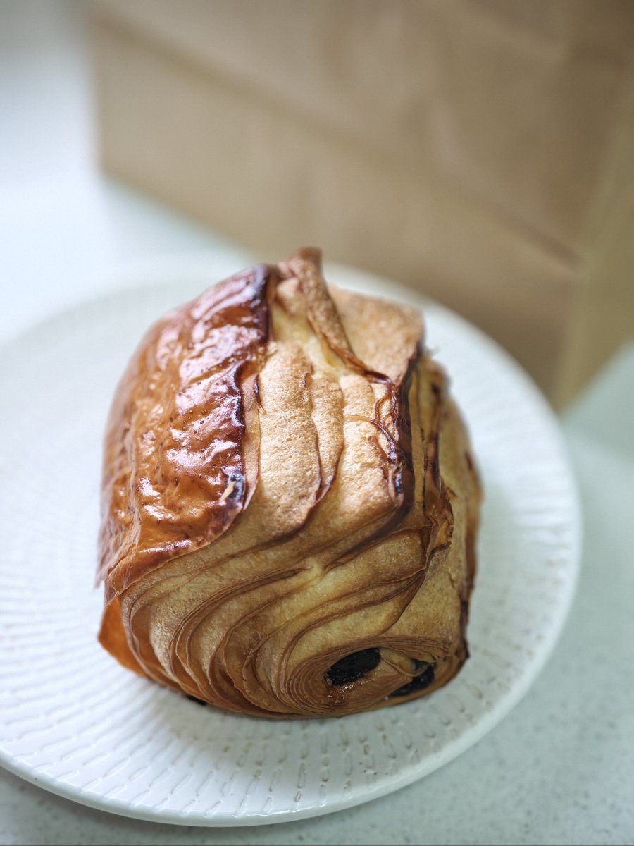 Beuleneule's tweet photo. Just had the most buttery, flaky croissant at the tiny corner bakery in downtown! Warm, crispy layers with a hint of salt—worth the 10-minute wait  Who’s tried it yet https://t.co/DSThVmUWvT