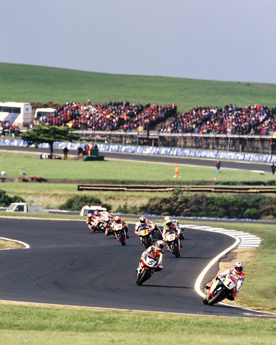 ausmotogp's tweet photo. THE LEGENDS OF PHILLIP ISLAND: Àlex Crivillé 🇪🇸
[Island Wins: 1997] 🏆

Prior to becoming the first Spanish rider to become a premier class World Champion, Alex Crivillé etched his name into Phillip Island folklore with a memorable victory at the Australian Motorcycle Grand Prix in 1997. 

In just its third instalment at Phillip Island, the 1997 race was packed with drama. After hometown hero Mick Doohan crashed out while leading, Repsol Honda teammate Álex Crivillé inherited the lead and took the victory.

A trailblazer of the sport and one of the many legends to conquer The Island. 👏

#AustralianGP #MotoGP