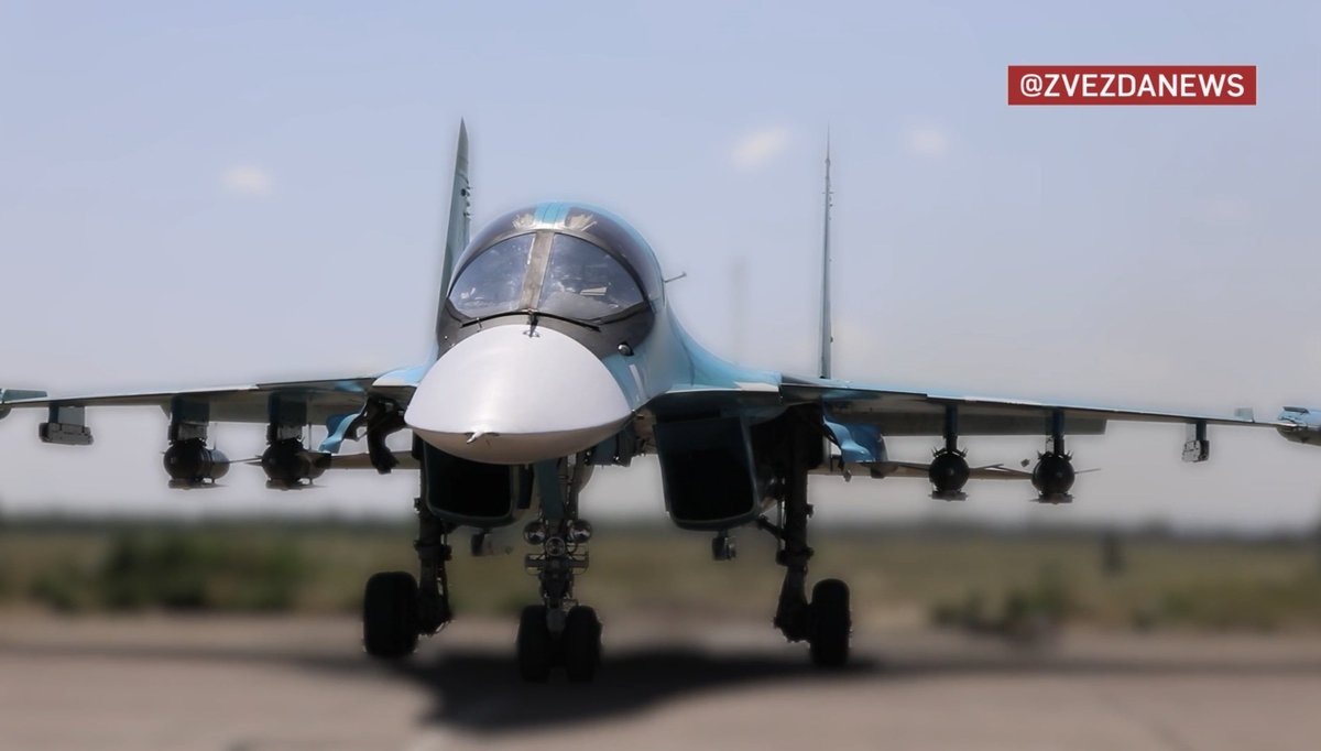 GuyPlopsky's tweet photo. For the first time, the Russian MoD released footage showing a VKS Su-34 NVO strike fighter armed with UMPB-5-equipped FAB-500T bombs.*

*"UMPB-5" is reportedly the designation of the guided glide kits seen here. https://t.co/3K7FLSXbzN