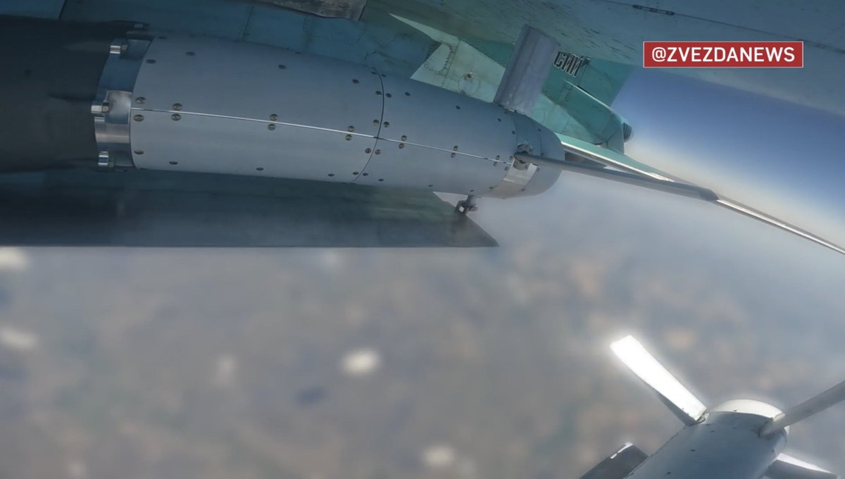 GuyPlopsky's tweet photo. For the first time, the Russian MoD released footage showing a VKS Su-34 NVO strike fighter armed with UMPB-5-equipped FAB-500T bombs.*

*"UMPB-5" is reportedly the designation of the guided glide kits seen here. https://t.co/3K7FLSXbzN