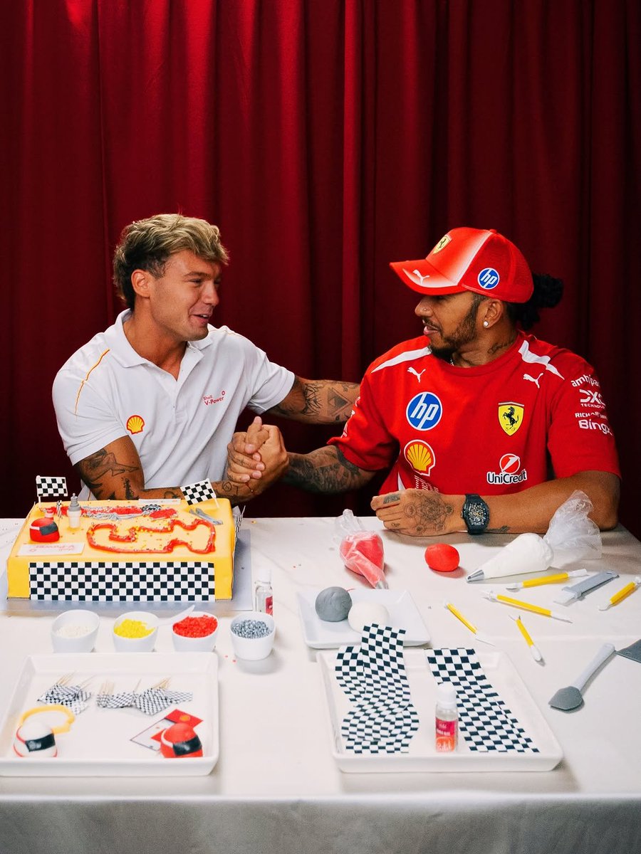 LH44Fanpage8's tweet photo. Lewis Hamilton helping MasterChef star lan Lucas design the cake at Ferrari event today in Budapest https://t.co/EeOVFMHkky