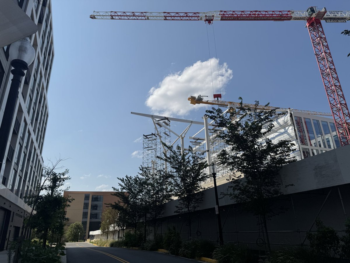 ArmchrPlanner's tweet photo. This development is so great! Practically a full city rising where there previously was just parking. The center gathering spaces are already being used by folks and it’s not even halfway done yet. This is going to age supremely well https://t.co/P3fwbqwFfs