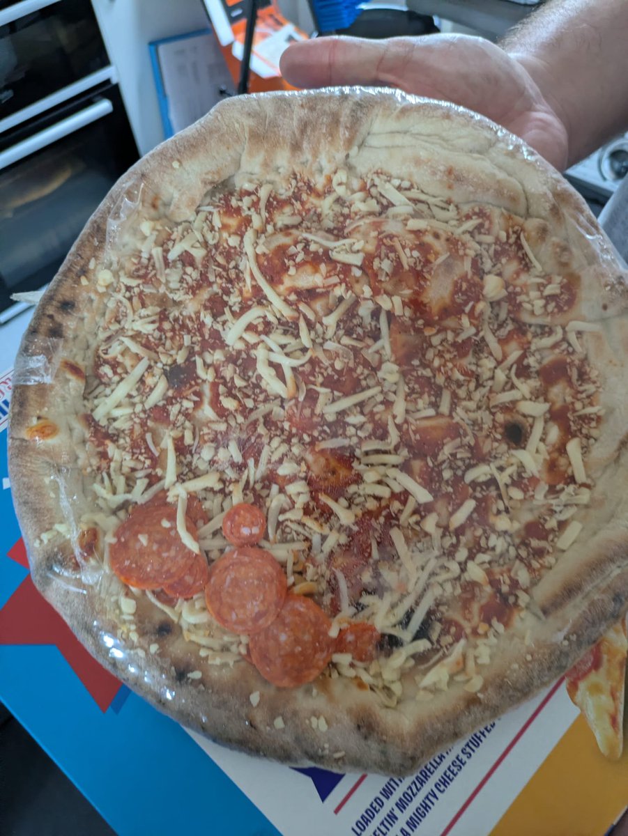 Malski28's tweet photo. @Morrisons - Just went to put a FULLY LOADED Pepperoni Pizza in the oven to be met with three pieces of large pepperoni and four pieces of small pepperoni (photo shows pizza still in cellophane wrapping.. Extremely disappointing https://t.co/L9fIVH4Qqy