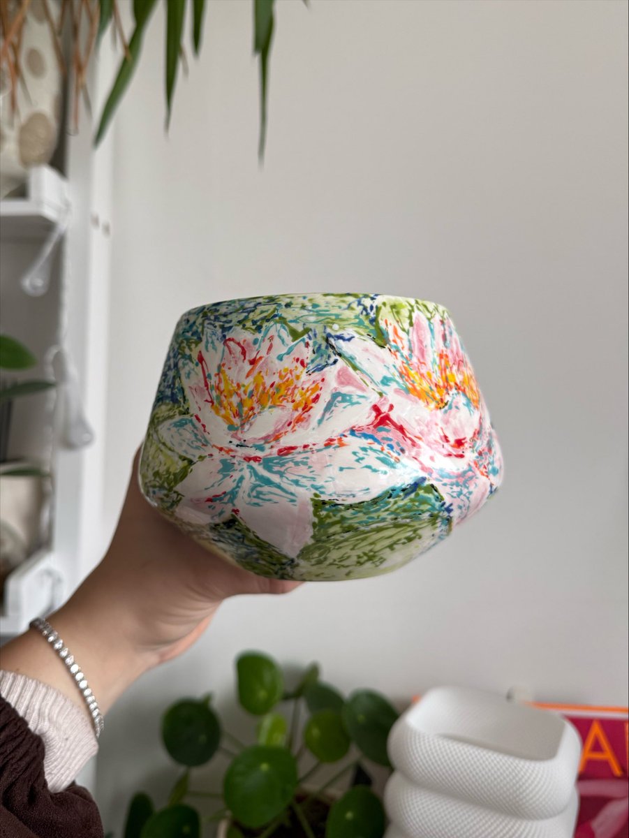 MegJDavies's tweet photo. This was my first pottery painting in yeaarrrs!!

Kinda wish the colours melted together more but she’s still cute🪷 https://t.co/3bFQKhWlq3