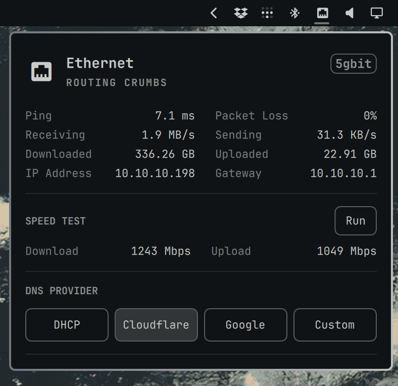 dhh's tweet photo. Omarchy Quattro's new network panel is a delight. All the major stats on the connection, easy-to-run speedtest, and direct selection for DNS. Of course mine is set to @Cloudflare 😄 https://t.co/brvz7NAGJZ