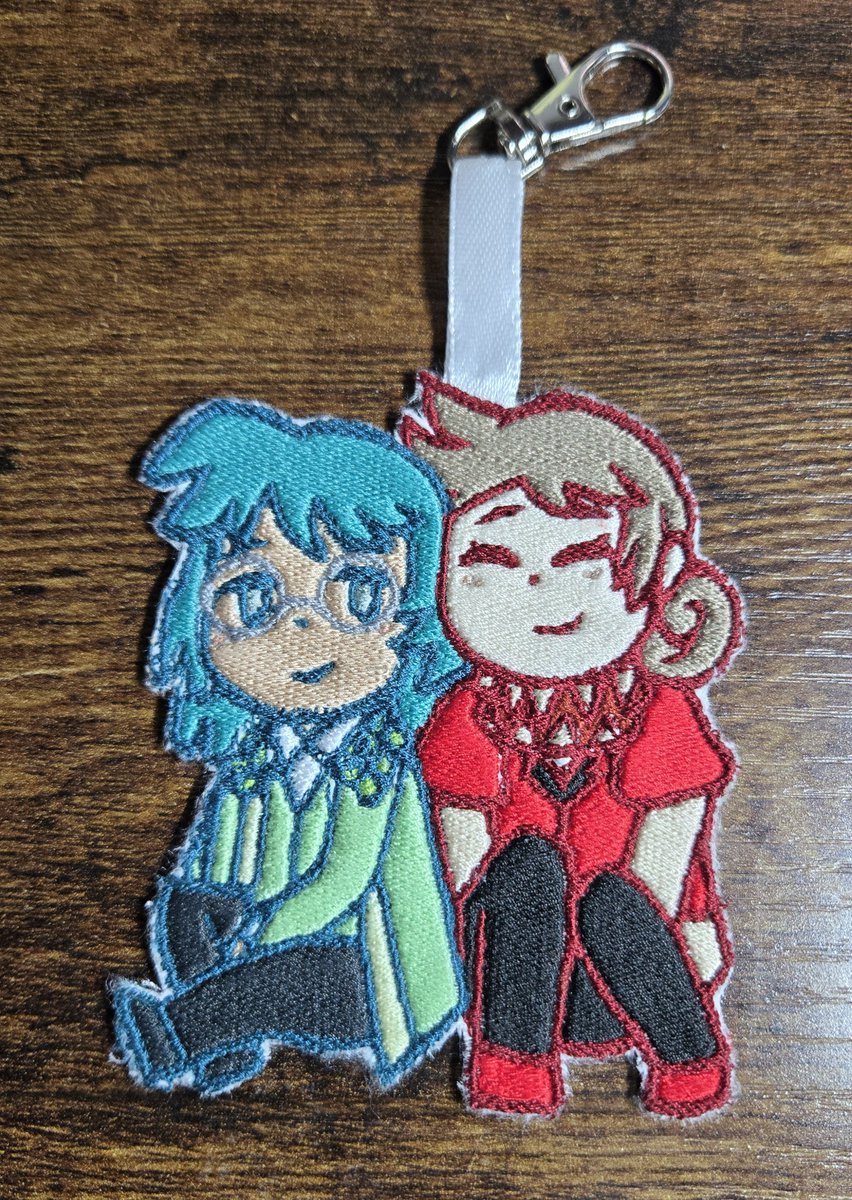 SewnFlowerPlush's tweet photo. Made a little keychain for myself of my girls Acacia and Emila i love them so much 😭

I need to make more keychains of my other lobotomy corporation ocs now i have so many im so attached to aah https://t.co/DTKgCq8DIt