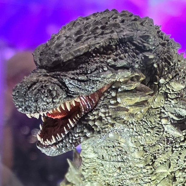 AnotherKaiju's tweet photo. I see some subtle inspiration from the MonsterVerse Godzilla design. Flatter head, extended eye ridges, and the base of the jaw sits further to back of the skull.  

I don't mind these changes but I personally would have preferred if they kept the head more or less the same. https://t.co/IrQoJdRBfv