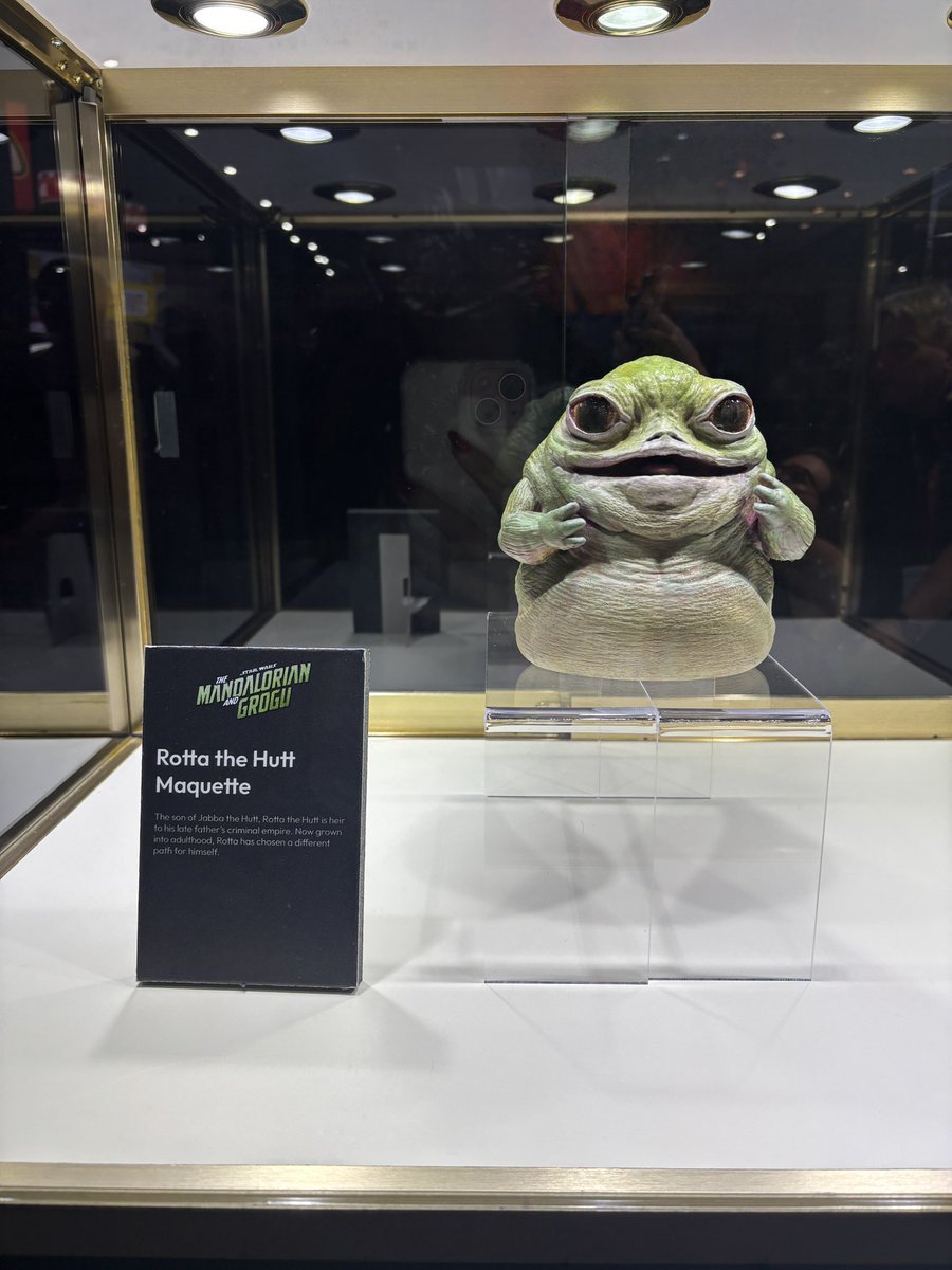 DEADLINE's tweet photo. The ‘Star Wars’ booth at the #SDCC ‘26 Exhibit Hall featured ‘The Mandalorian and Grogu’ https://t.co/FkBq0BAwkk
