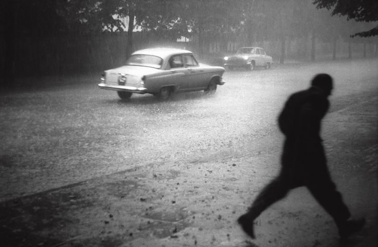 eyeonaxis's tweet photo. Vilnius under the rain, Lithuania, 1959, by Antanas Sutkus https://t.co/5yh42kcqmU