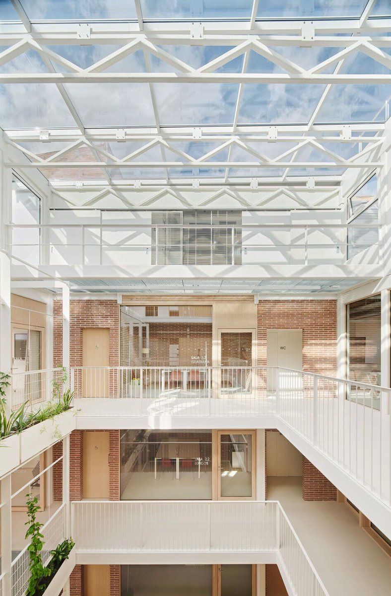 Archello's tweet photo. LAOS transformed Barcelona’s Sants Social Center through adaptive reuse, combining preserved masonry with a lightweight steel and CLT structure. 
https://t.co/JRlvCdnJKo

#AdaptiveReuse #CLT #CircularArchitecture https://t.co/lEMW5JlMb7