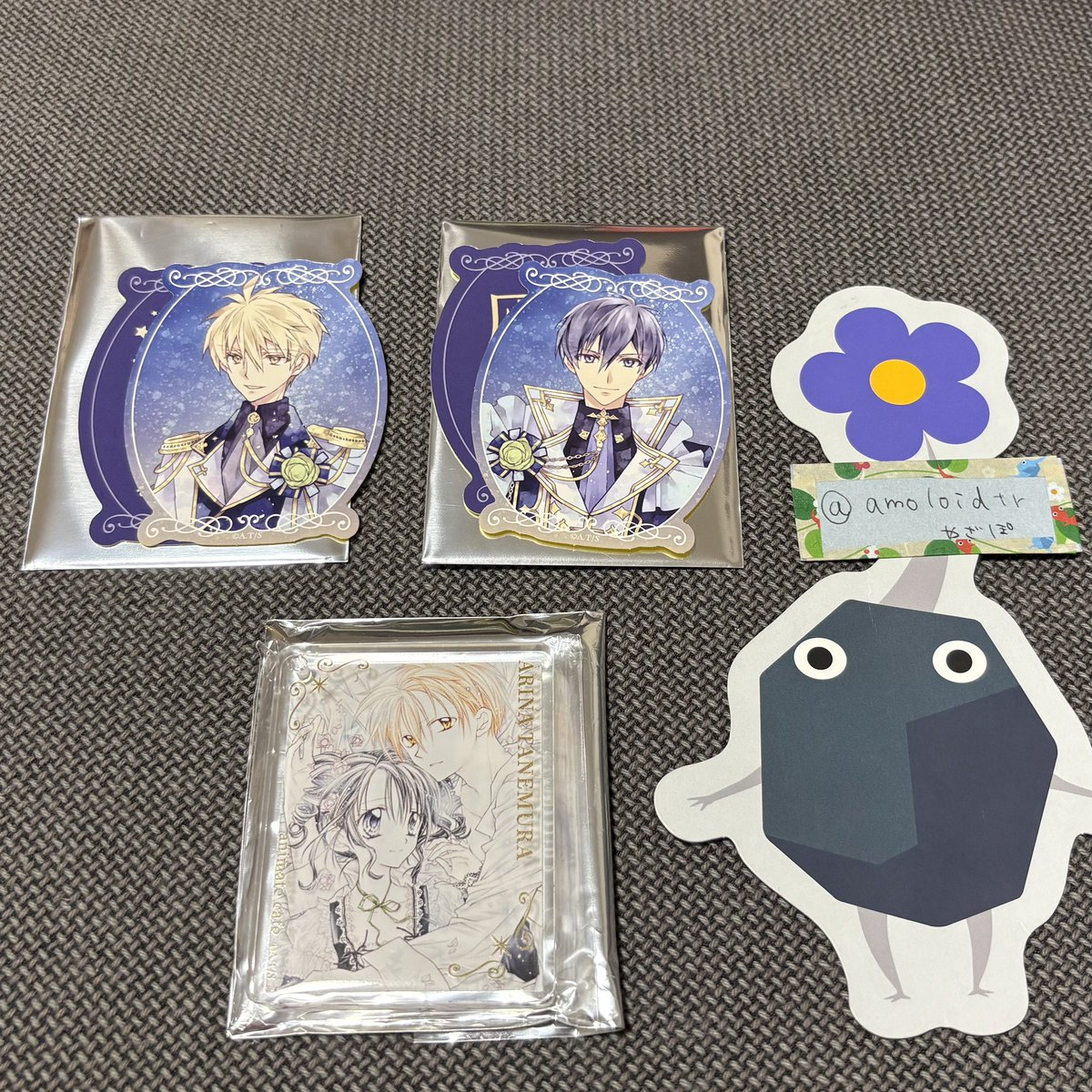 amoloidtr's tweet photo. 【交換】種村有菜　アニメイトカフェ　アニカフェ　セリフ　ステッカー　コロッタ　缶バッジ

【譲】画像1(高成、英知、満月)
【求】画像2(タクト)

セリフ入りステッカーセットに対しては複数提供可能です。
異種含んでおり難しいかと思いますが、よろしくお願いいたします。 https://t.co/4A4WQHXLT3
