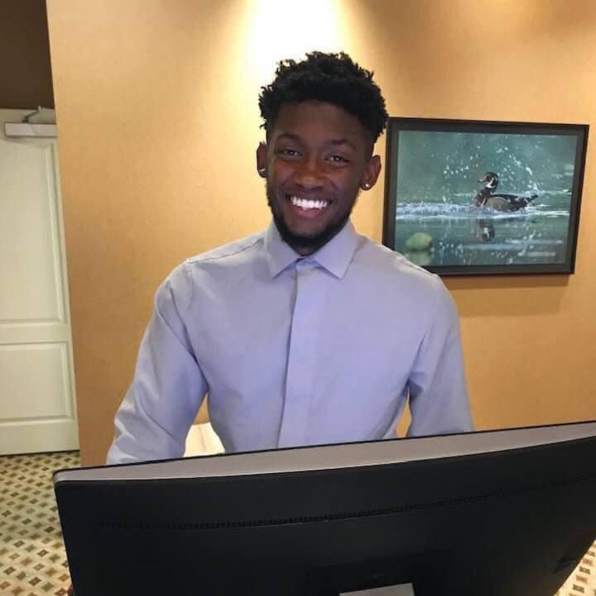 feelgoodtale's tweet photo. Meet Satchel. He is the only employee here at Homewood Suites in Beaumont. The access road is underwater and I10 is shut down due to flooding. We can’t get in or go out. The hotel a mile from us is under water. Satchel has been here all night. His coworkers couldn’t make it to work so he stayed. He has manned the phones, answered each of our questions, ensured that we have had a hot cup of coffee or tea, and helped serve us a hot breakfast. He has handled this situation with grace, kindness, and a beautiful smile on his face.

Sometimes we ask ourselves why God allows things to happen but we are not designed to understand his ways. I do think that sometimes He allows things to happen so we can be His light and share the love of Christ with others. I have seen a big teddy bear of a man washing dishes and serving eggs, a little grandmother wiping down tables, and a man drenched from head to toe because he crossed i10 to deliver bottles of water to truck drivers who have been stranded on i10. We saw a helicopter land at the hotel adjacent to us where the parking lot is underwater. Someone had to be flown out. I’m looking at my table and see a leftover bagel from breakfast, my hot cup of tea, my cozy socks, and dry tennis shoes. I am thankful for each of these things and for the peace in knowing that my family is safe and sound. Please pray for us and that we can each make it home safely to each of our families.

If you know Satchel, tell him he is our hero! He gave me permission to share his picture. What an example of how to handle yourself in a crisis! Goodness gracious! I will stay here next time just knowing that despite whatever happens, I will have someone putting our needs above his own needs. Thank you Satchel for taking care of us here at Homewood in Beaumont. 😊