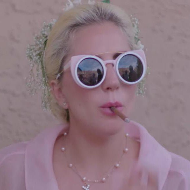 AMENARTPOP's tweet photo. 10 years ago, lady gaga smoking a blunt after attending her goddaughter’s baptism. https://t.co/BvcO3PI8rJ