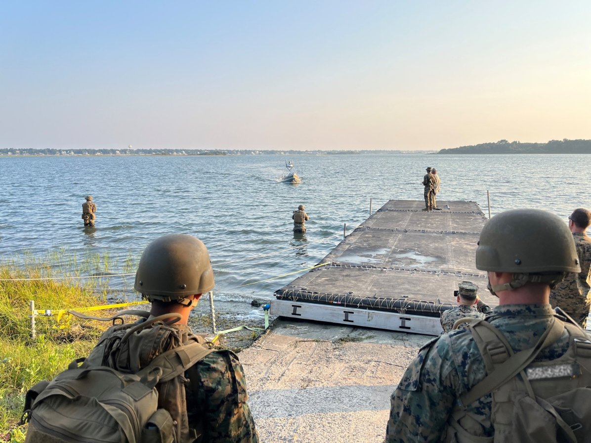 BlackSea_Tech's tweet photo. In 2023, GARC autonomously transited 150 nautical miles through congested inland waterways to deliver supplies, including fuel, in support of a U.S. Marine Corps effort exploring Expeditionary Advanced Base Operations (EABO) logistics.

After reaching shore, GARC pumped fuel directly from an auxiliary tank into Marine Corps vehicles on the beach.

Moving fuel where it is needed, without putting another crew in harm’s way, remains one of the most promising applications for autonomous surface vessels.