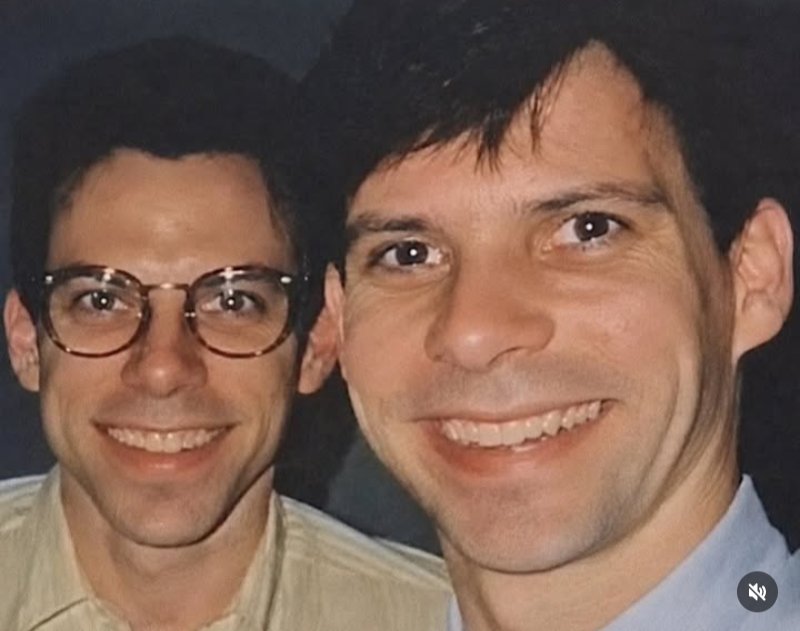 johanzc_k's tweet photo. According to Anna Eriksson, Lyle's former wife, during the years of the trials Erik and Lyle were only allowed to wear civilian clothes while appearing in court. 

Before entering the courtroom, they changed into those clothes in the courthouse holding cells, and once the hearing ended, they had to change back into their blue jail uniforms before being transported back. This procedure suggests that photos like this one were likely taken on a court day, either before or after a hearing, although there is no official source confirming the exact date or moment when it was captured.

Anna also shared that this photo was taken while she was dating Lyle, around 1994, so she believes it may date back to the time of the first trial. She admitted that this has always been her least favorite photo of Lyle because, in her own words, "He looks tired, sick, and has that 'everything is fine' smile—but it doesn't reach his eyes. That forced smile he learned as a child." It is a personal reflection from someone who knew him closely during that period, offering an intimate perspective on how she perceived him at the time.

#LyleMenendez #ErikMenendez #MenendezBrothers #MenendezCase #JusticeForTheMenendezBrothers