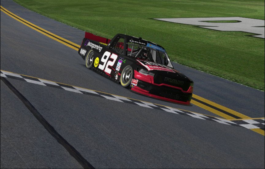 JSTOGaming_'s tweet photo. Racing the @EliteRacing_ Trucks and Grand National Series for 26B. On the B-post is a tribute decal that I will be carrying for the whole season in honor of my grandfather who passed away earlier this month. Here's a look at the truck. Will post the Grand National scheme soon. https://t.co/2vVxvfb01Z