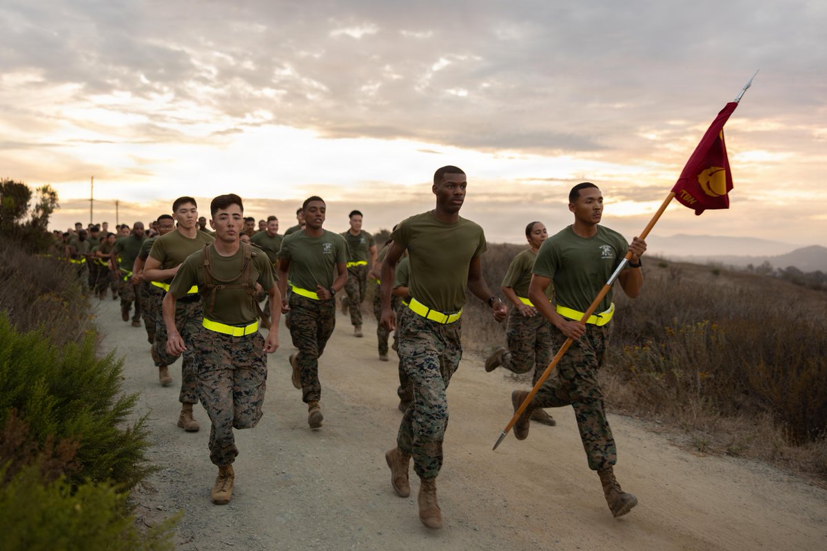 USMC's tweet photo. #Marines on @MCIWPendletonCA taking part in Corporals Course 4-26 participate in a trail run at Marine Corps Base Camp Pendleton, Calif. 

During the run, Marines read citations for Medal of Honor recipients to remember and honor Marines and Sailors from the past.

#MarineCorps #USMC #SemperFi #Military