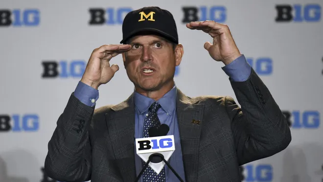 10YearsAgoCFB's tweet photo. Harbaugh takes the podium in Chicago and the room can't keep up. He talks NASCAR, soccer, and whether he invented the word "meritocracy."

Year two in Ann Arbor. Michigan hasn't won the East yet, but nobody's picking against them either. https://t.co/vFwHZYivQW