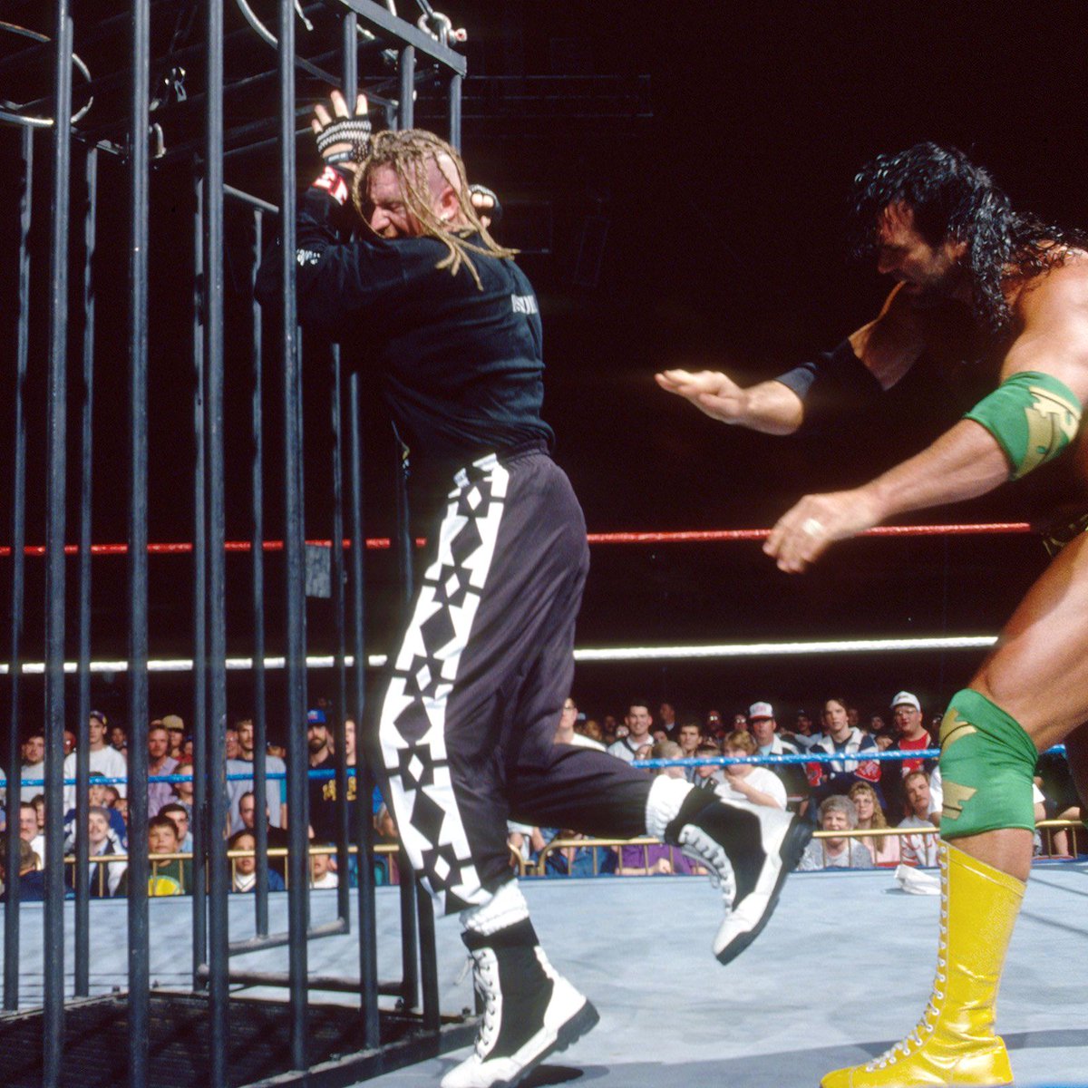 WWFWrestling1's tweet photo. ๐ฅ Federation Flashback! Jeff Jarrett & Razor Ramon battle during a TV taping in Des Moines, Iowa on April 25, 1995. Roadie was placed in a cage above the ring during the match which was later released on the WrestleFest '95 video tape. #WWF #WWE #Roadie #JeffJarrett #RazorRamon https://t.co/IqeRWAxbmi