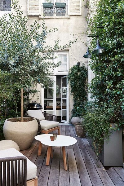 saltineshop's tweet photo. @aurearch Courtyard of a Paris apartment by Amal Aflak with Kettal Bitta furniture. Photo by Stephan Julliard https://t.co/009mBofGUY