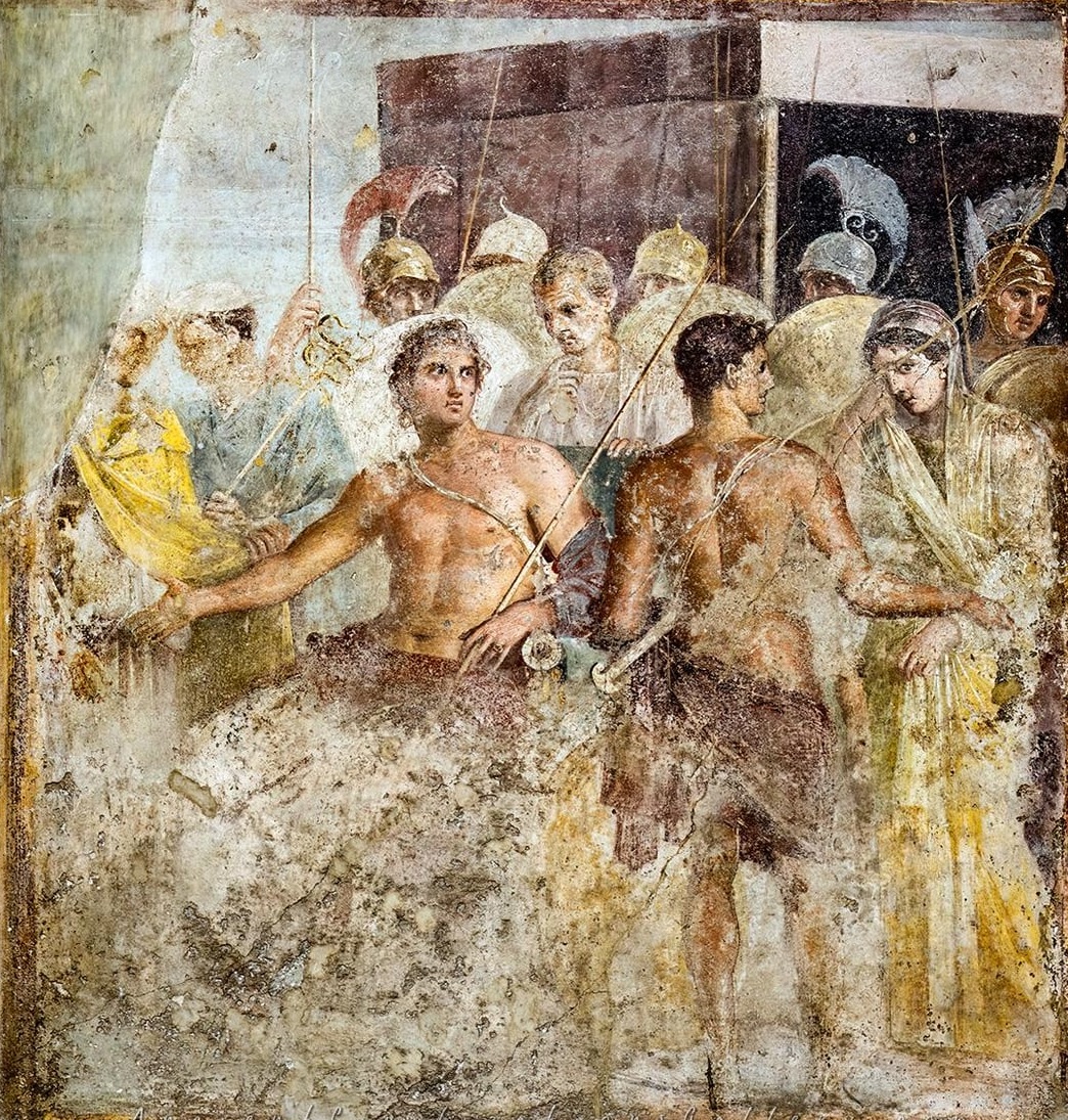 HistoireOdyssee's tweet photo. Voici l'une des plus anciennes représentations d’Achille.

La fresque représente un épisode majeur du chant I de l'Iliade : les hérauts d'Agamemnon viennent reprendre Briséis, captive attribuée à Achille après la prise de Lyrnessos. Contraint de céder son butin, le héros voit son honneur bafoué.

Cette fresque, peinte entre 62 et 79 apr. J.-C., ornait la Maison du Poète tragique à Pompéi. Ensevelie par l'éruption du Vésuve, elle est aujourd'hui conservée au Musée archéologique de Naples.

Cette peinture est aussi un précieux témoignage de la manière dont les Romains du Ier siècle se représentaient les héros de la mythologie grecque.

En savoir plus sur l’Odyssée : https://t.co/ltXovpmQbl