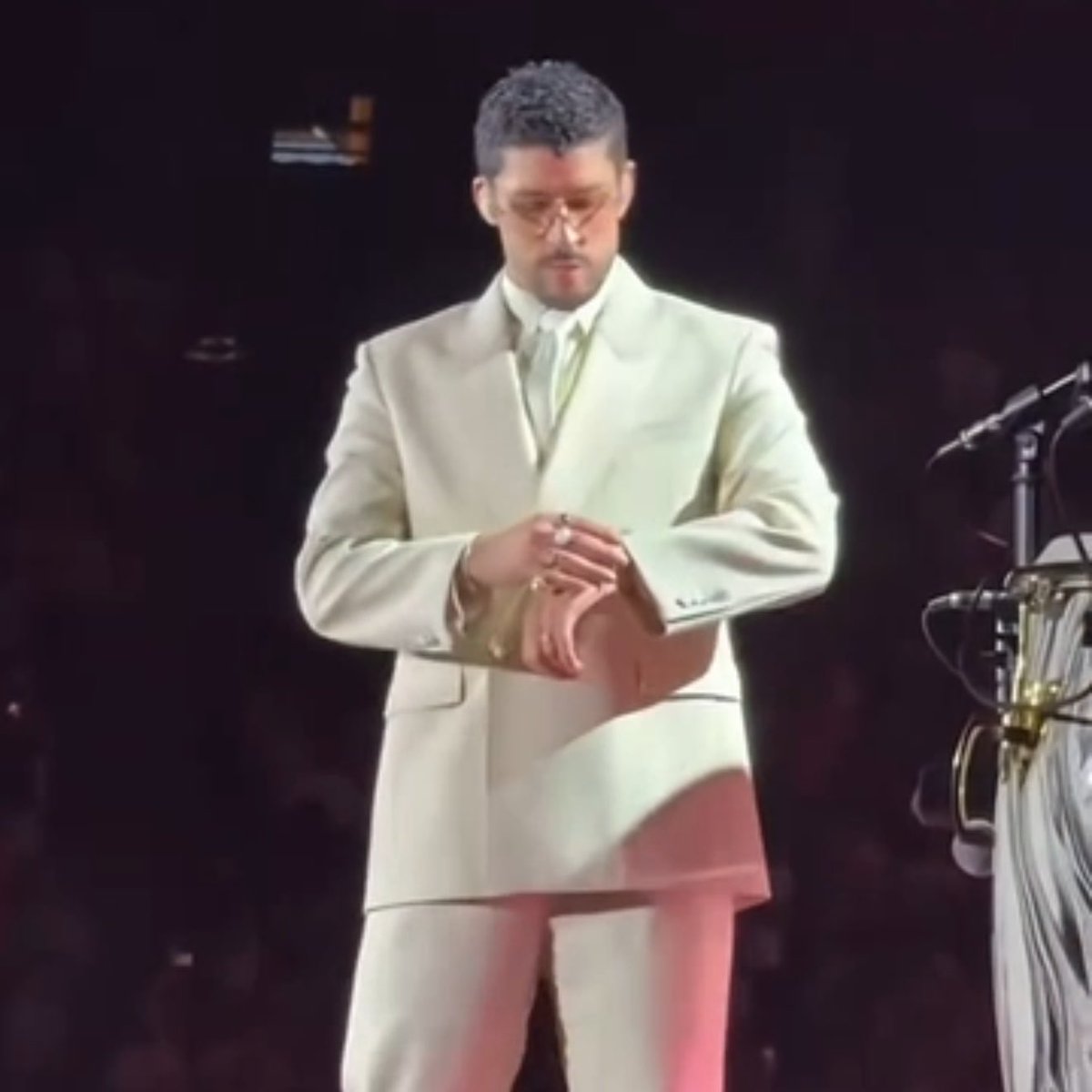 BBPRTV's tweet photo. Bad Bunny en Estocolmo, Suecia, haciendo el mismo gesto que provocó múltiples teorías en su último TikTok. 🤨 https://t.co/M9jrYiMugW