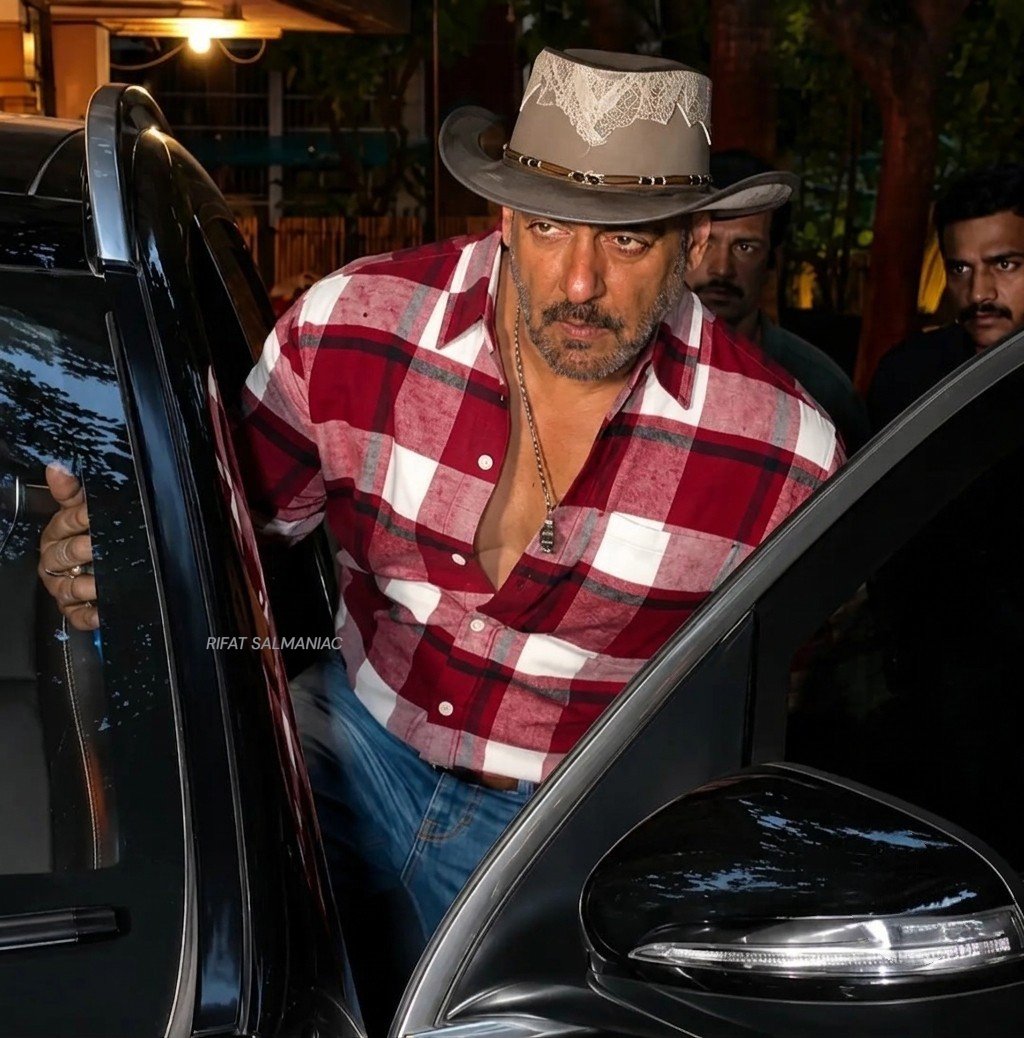 Being_Rifat's tweet photo. #SalmanKhan has been experimenting heavily with rugged, high-fashion wanderer and cowboy styles. The combo of a classic plaid shirt, faded denim, and that distinctively styled cowboy hat perfectly channels his signature effortless alpha energy. https://t.co/iUYFEvtvfD