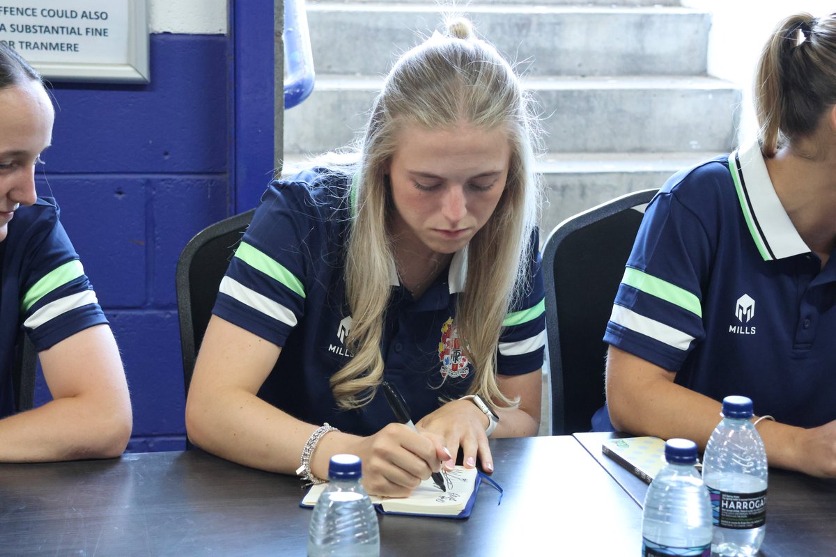 TRFCWomen's tweet photo. 🖊 The team took part in a signing session this afternoon as part of the clubs open day.

We enjoyed getting to meet supporters and look forward to seeing you again at our games this season.

#TRFC #SWA https://t.co/j0Mc2Uf1M3
