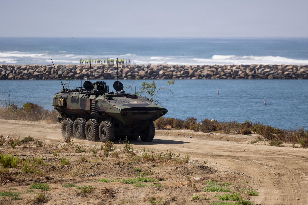 USMC's tweet photo. #Marines with 1st Marine Division operate an Amphibious Combat Vehicle at @MCIWPendletonCA, California. 

Amphibious vehicle crews execute diverse training evolutions across both land and sea, strengthening their ability to operate effectively in austere, complex, and turbulent battlespaces. 

#MarineCorps #USMC #SemperFi #Military