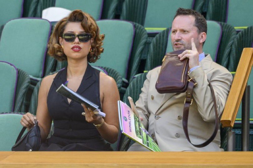 Raye21stcentury's tweet photo. 📸 Raye and her dad watch the Women's Doubles Finals of the Wimbledon Tennis Championships. https://t.co/YqPAUIk3qi