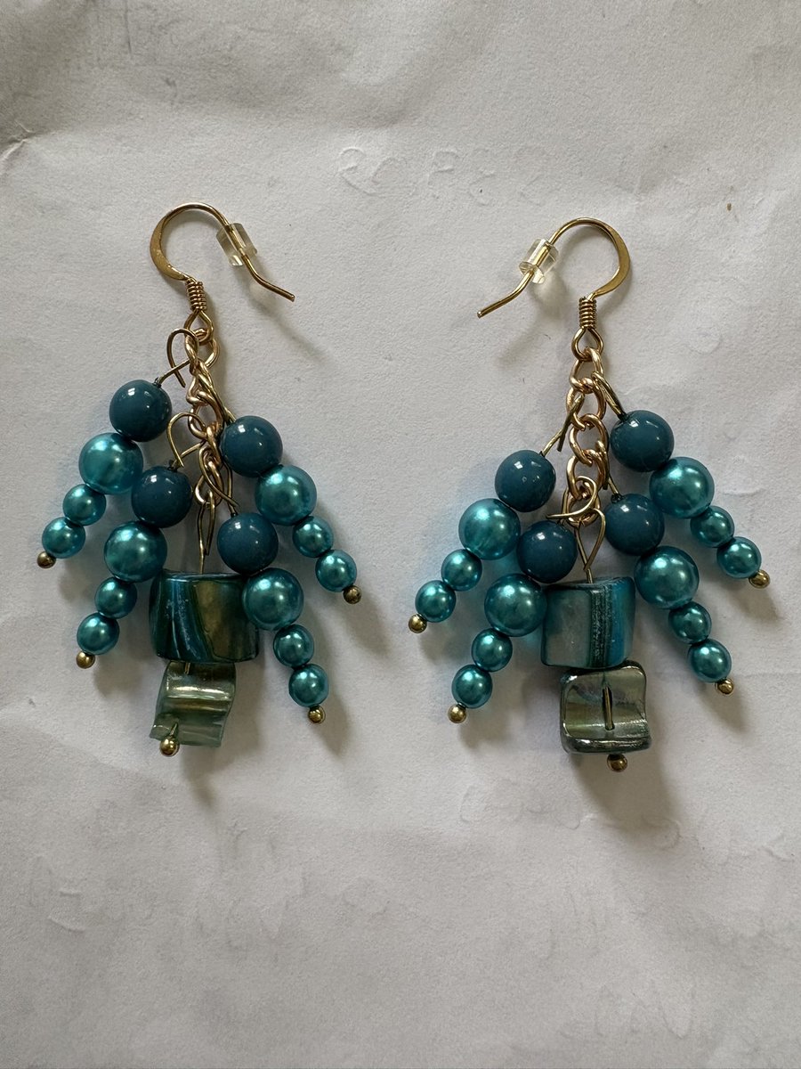 mesatik's tweet photo. A good family friend of ours needed a “thank you” gift for a friend who likes showstopper earrings &amp; likes the color turquoise. So I made these.
#hiddenlightsbyMeira https://t.co/zzFOsQbtQl