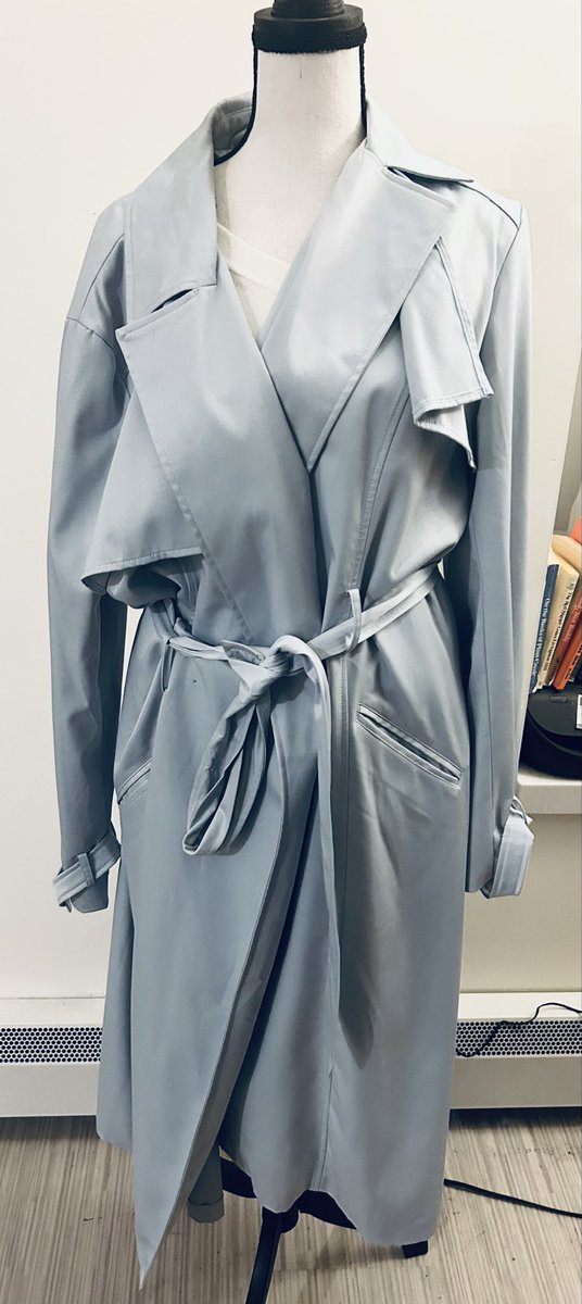 BattleLaqueen's tweet photo. Light silver blue New York & Company midcalf length coat. 
For sale - $50.00
This double-breasted outerwear is size XXL and has a matching waist tie belt. 
It is made of a smooth fabric and includes wide lapels and adjustable cuff straps.

Available for shipping or local pickup in Cambridge.

Much love,❤️ 
LaQueen