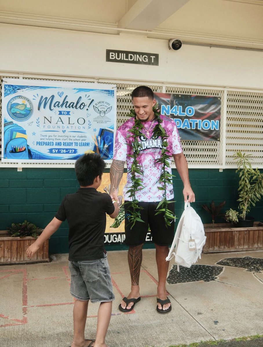 Sheena_Marie3's tweet photo. More photos from Tetairoa McMillan’s backpack giveaway in Waimānalo. #Panthers https://t.co/z5dKxqO9YL