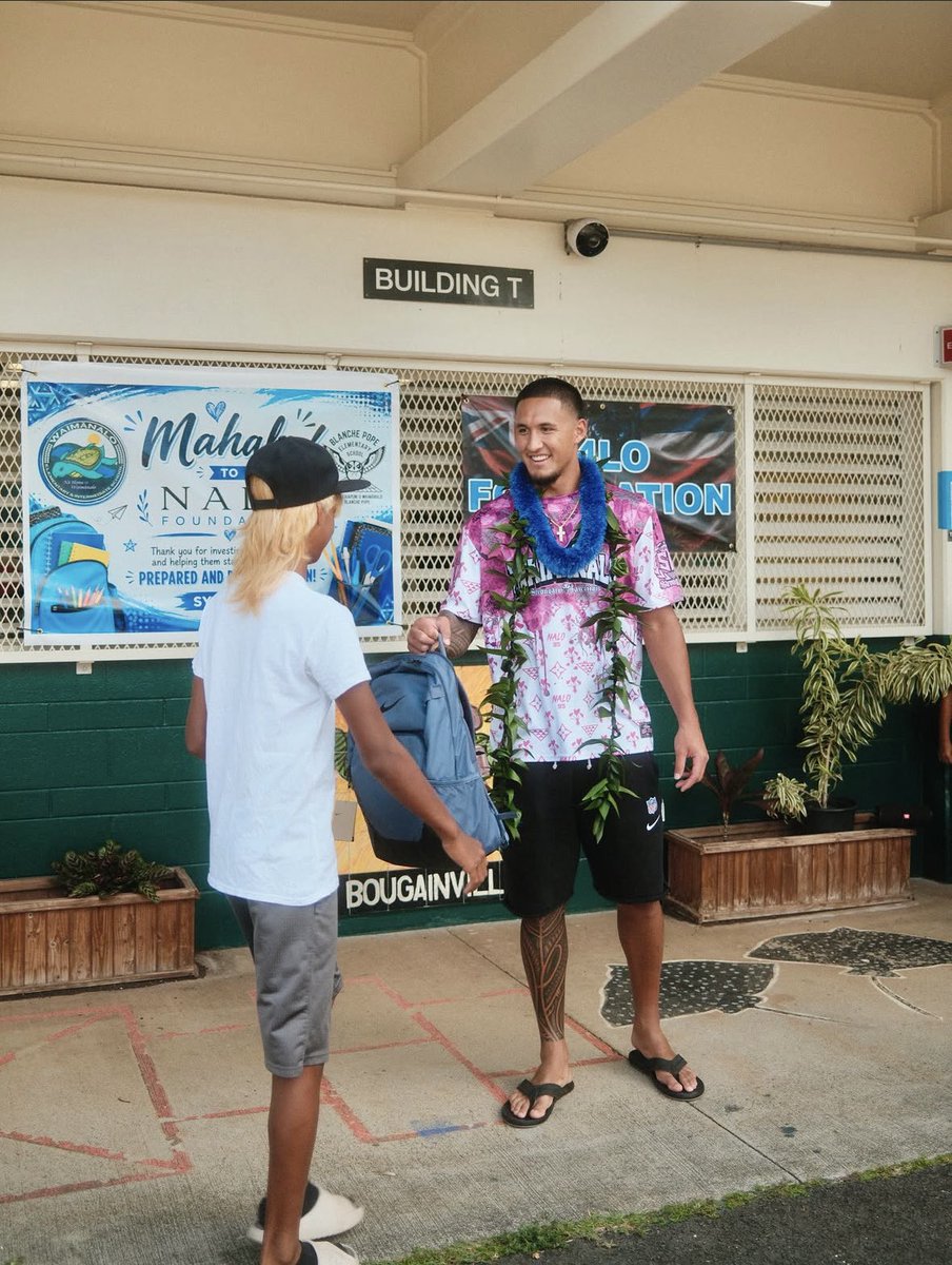 Sheena_Marie3's tweet photo. More photos from Tetairoa McMillan’s backpack giveaway in Waimānalo. #Panthers https://t.co/z5dKxqO9YL