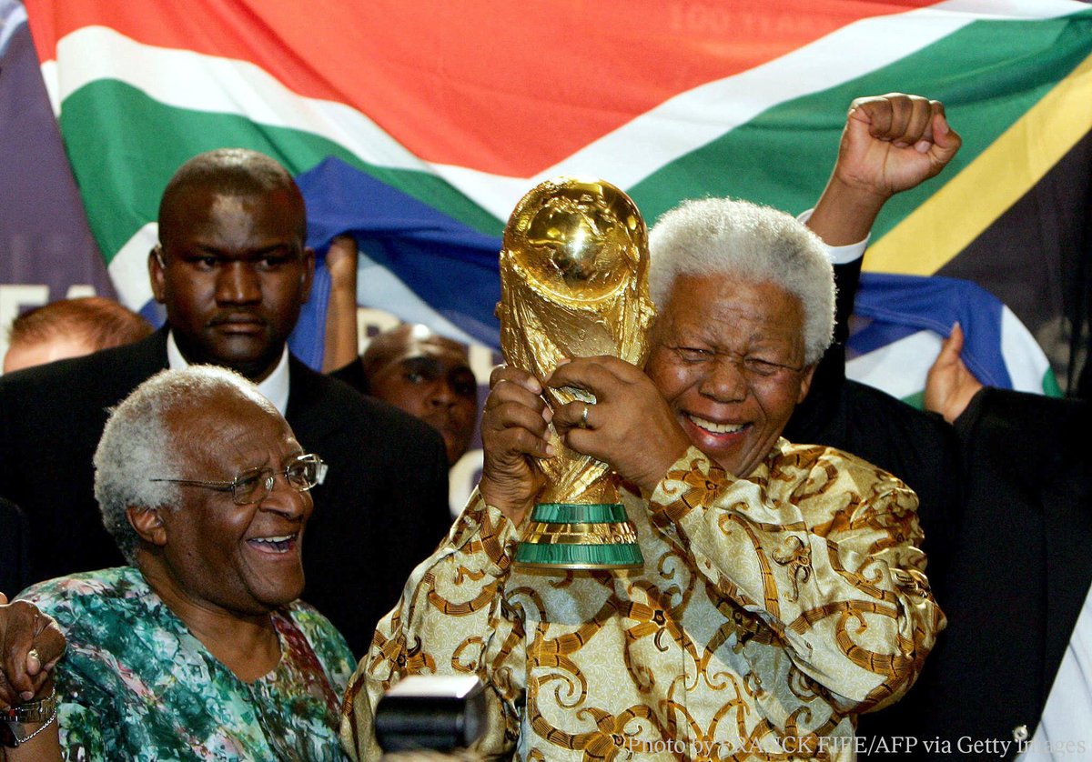 NobelPrize's tweet photo. “Sport has the power to inspire and unite people,” said Nelson Mandela. The peace prize laureate watched fellow political prisoners play the beautiful game while he was incarcerated, and as President of South Africa, used sport to bring people together. https://t.co/QPQ4iiBbDK