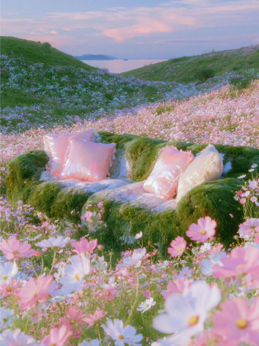 vibes_of_AI's tweet photo. A moss-covered sofa rests among endless fields of pink flowers, let's sleep where dreams bloom.#dreamscape #digitalart #surrealism #fantasy #flowers #nature #dreamcore #visualart #cozy #sleepy https://t.co/3OfbvxdKTj