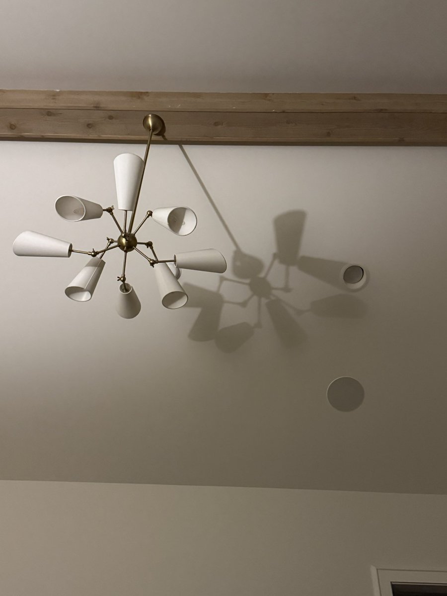 dicknbalsmobile's tweet photo. This lamp’s shadow looks like a cartoonish spider https://t.co/fP9mcq3qoF