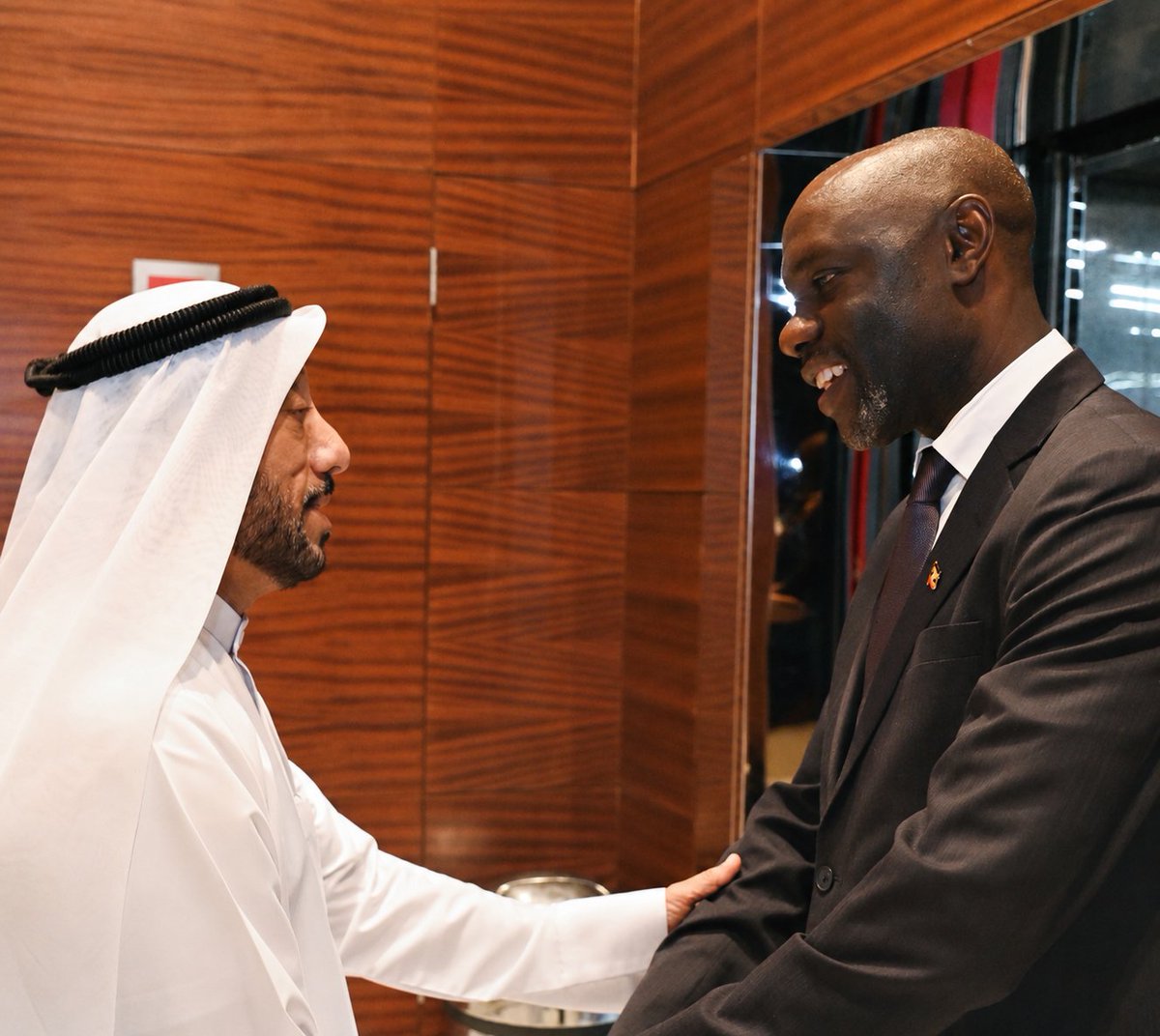 UgandaUae's tweet photo. Uganda and Sharjah Strengthen Economic and Trade Cooperation

His Excellency Zaake Wanume Kibedi, Ambassador of the Republic of Uganda to the United Arab Emirates, held a productive meeting with His Excellency Abdallah Sultan Al Owais, Chairman of the Sharjah Chamber of Commerce and Industry (SCCI), to explore opportunities for strengthening bilateral trade, investment, and economic cooperation.

During the meeting, Ambassador Kibedi presented the preliminary programme for the Uganda–UAE Business Forum, scheduled for October 2026, which will bring together senior government officials, leading business executives, and representatives of major Ugandan companies to explore new partnerships and investment opportunities.