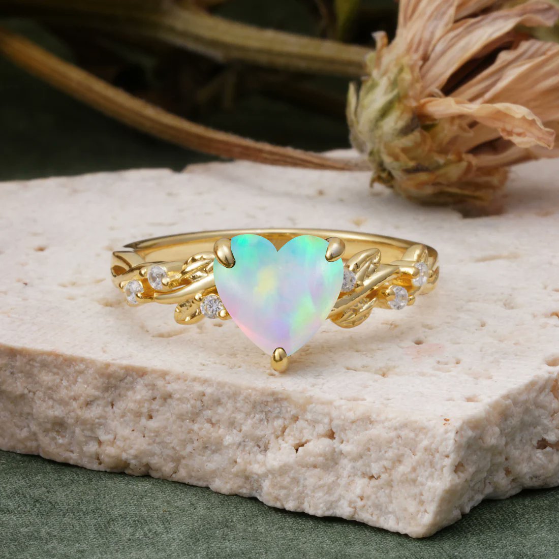 Romalarjewelry's tweet photo. Ethereal romance. 🌿 This classic leaf-entwined Heart Opal captures pure iridescent magic. A fairycore dream. 🤍 #Opal #HeartRing #Fairycore #LeafRing #ROMALAR https://t.co/LSpGTOORE0