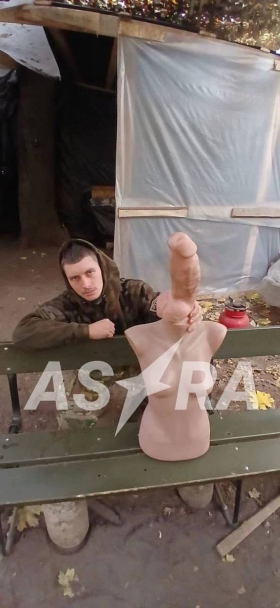 visegrad24's tweet photo. Russian soldiers beat their fellow soldier to death with a giant rubber dildo

Russian soldier Dmitry Poloymov, callsign “Fizruk,” was kept chained to a wooden post for several days while being abused. His fellow servicemen then took a giant dildo and beat him to death.

The widow of the murdered Russian soldier received her husband back in a “sealed coffin” accompanied by a document claiming he died of “heart failure.”

When the murder came to light, Russian commanders tried to cover it up. 

The main suspects were Dmitry’s comrades with callsigns “Iva” and “Skys.” During the investigation, their commander sent them on a “meat assault,” after which one was killed and the other wounded.

The commander himself had previously been accused of kidnapping people, abuse of power with torture, and murder.